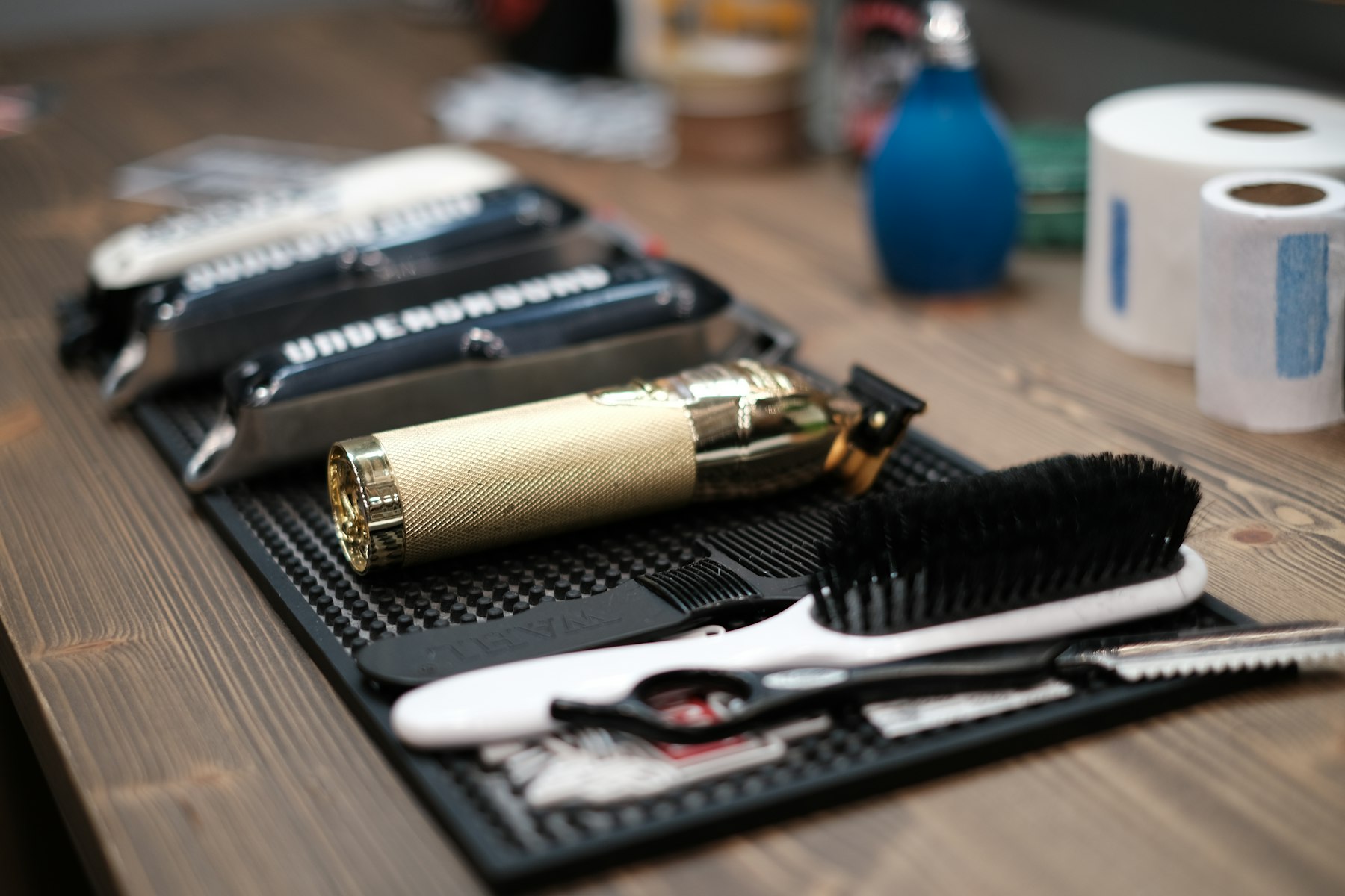 Sample photo: clippers, brush and scissors on a mat